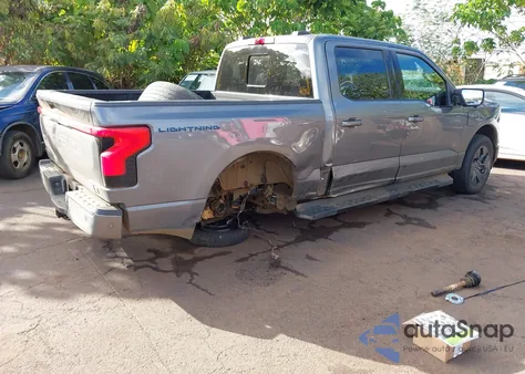 2022 Ford F-150 Lightning Lariat z USA, uszkodzony, nr VIN 1FTVW1EV0NWG11407